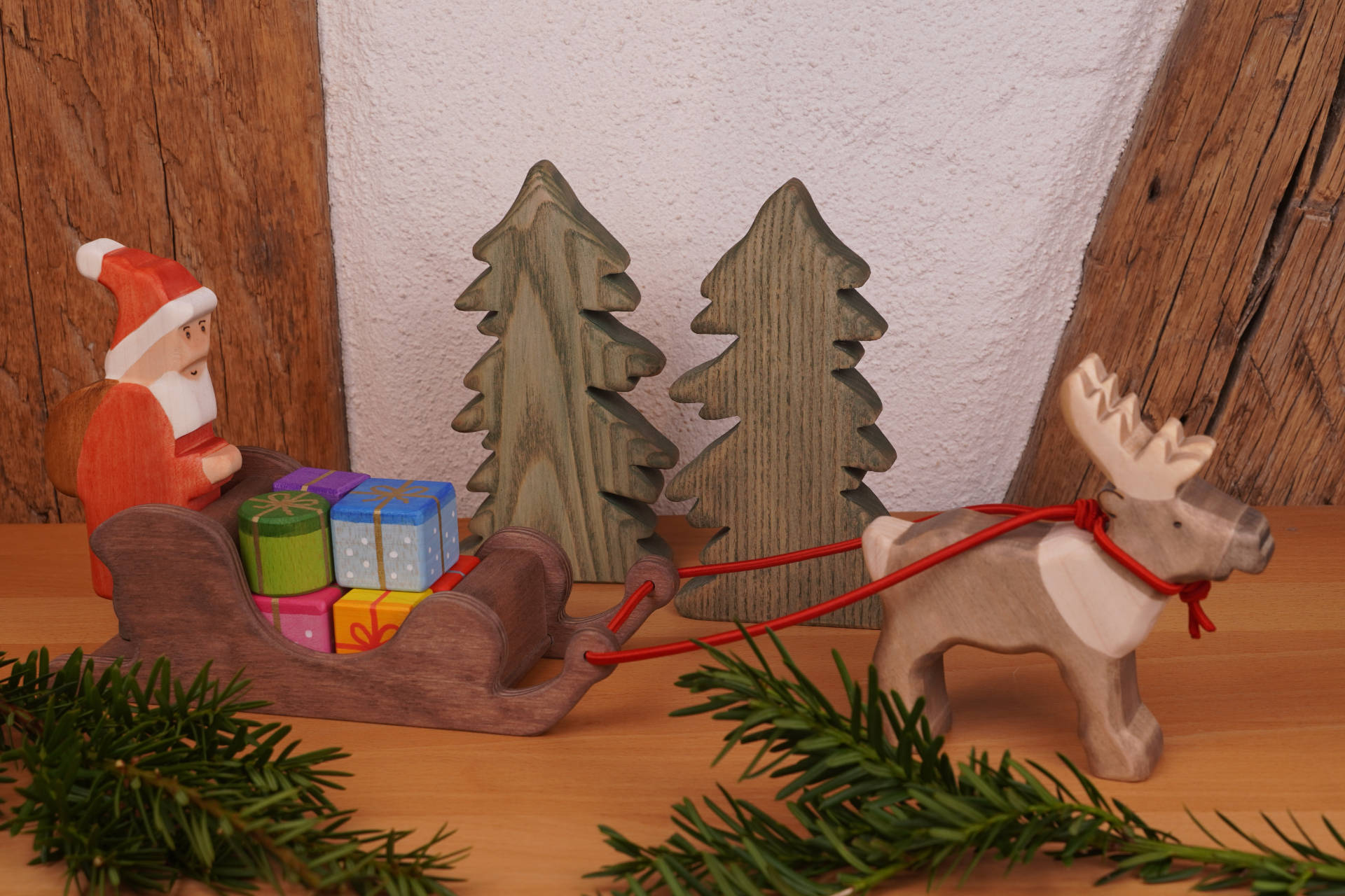 Weihnachtsmann mit Rentierschlitten