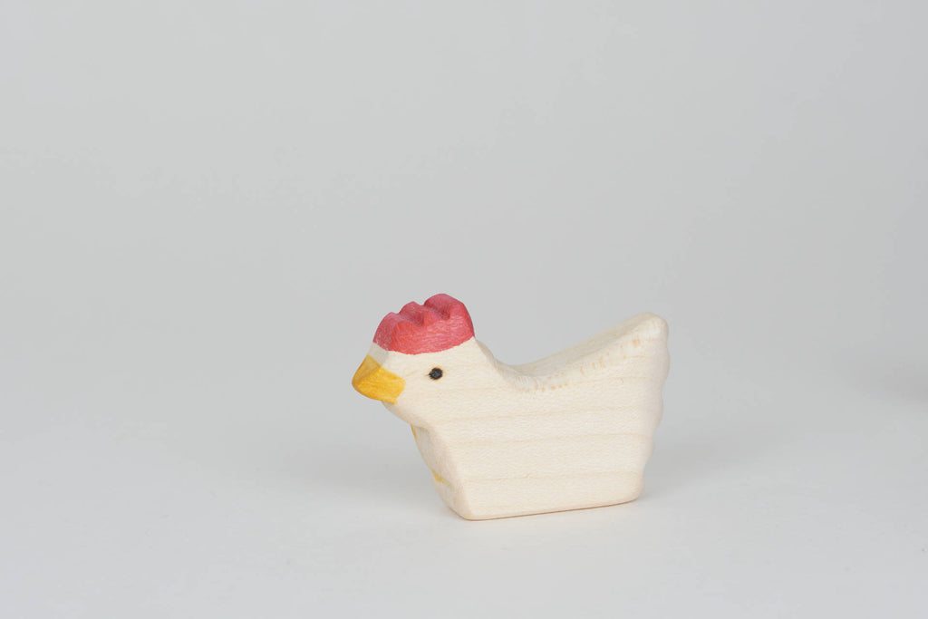Huhn weiß sitzend
