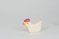 Huhn weiß sitzend