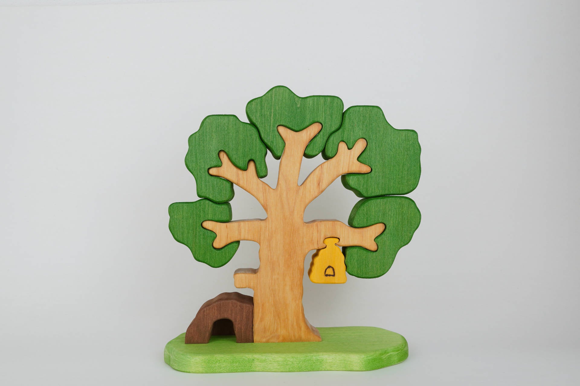 Puzzle-Baum mit Bienenstock