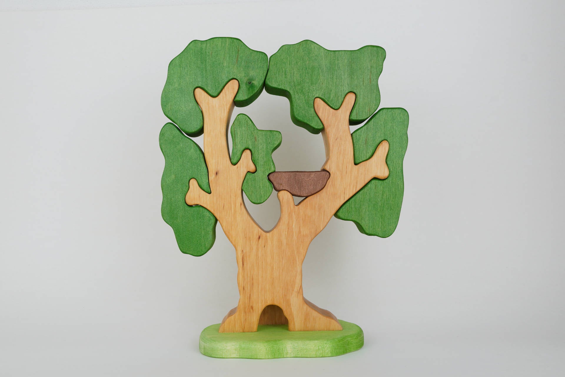 Puzzle-Baum mit Vogelnest