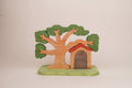 Puzzle-Baum mit Zwergenhaus
