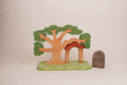 Puzzle-Baum mit Zwergenhaus